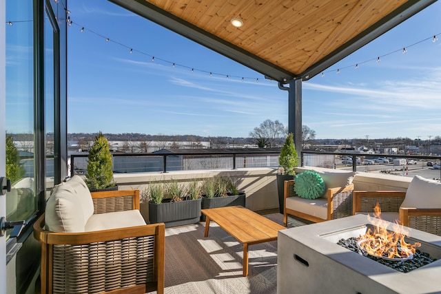 exterior space featuring an outdoor fire pit