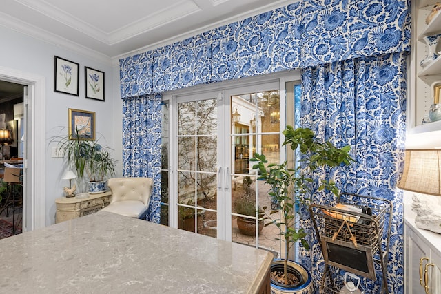 interior space featuring french doors and ornamental molding