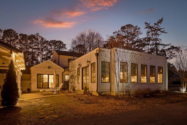 view of front of property with a patio