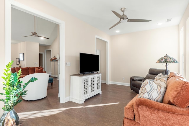 living room featuring hardwood / wood-style flooring and ceiling fan