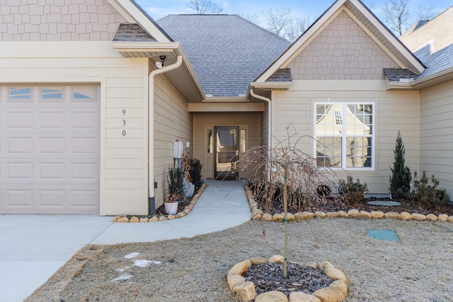 entrance to property featuring a garage