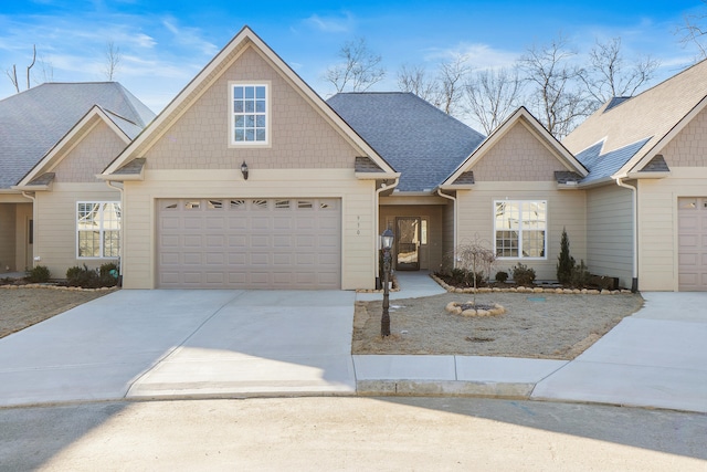 craftsman house with a garage