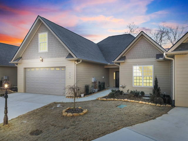 view of front of property with a garage