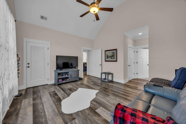 living room featuring ceiling fan, hardwood / wood-style floors, and high vaulted ceiling