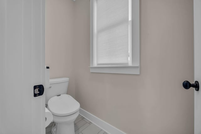 bathroom featuring toilet