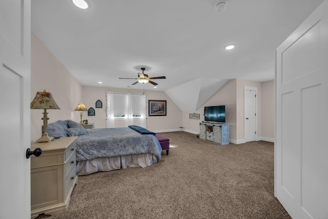 bedroom with vaulted ceiling, carpet flooring, and ceiling fan