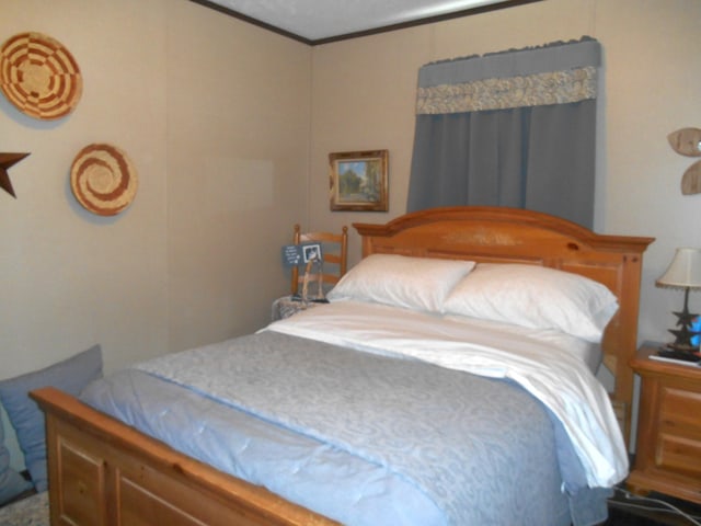 bedroom featuring ornamental molding