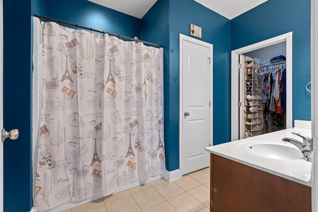 bathroom featuring tile patterned floors and vanity