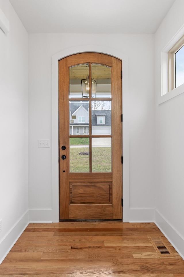 doorway featuring light hardwood / wood-style floors