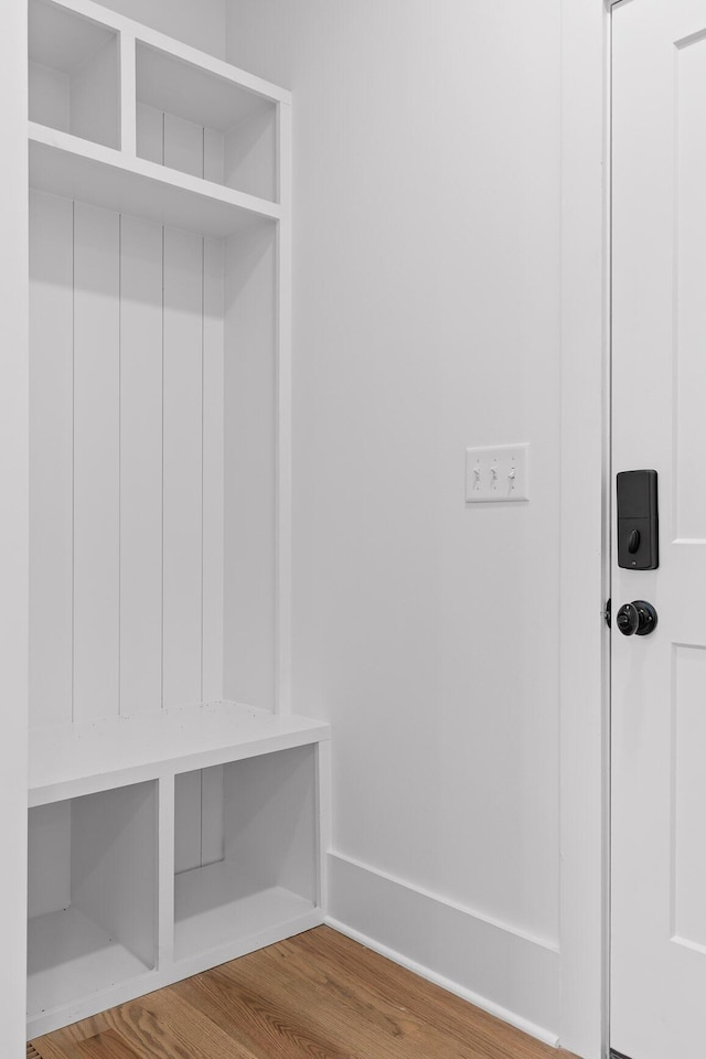 mudroom with hardwood / wood-style flooring