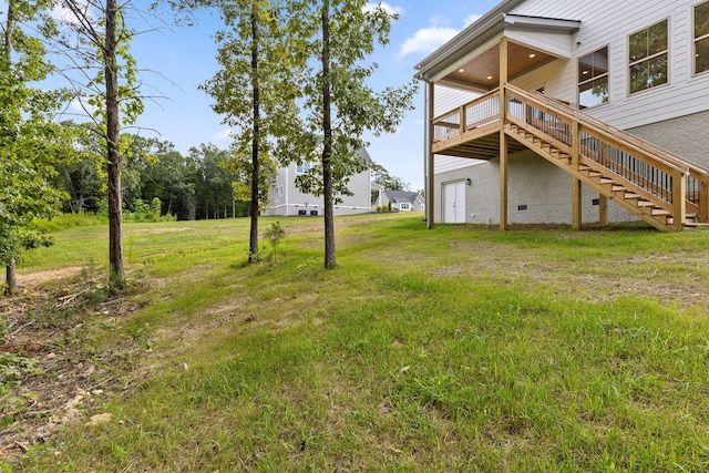 view of yard featuring a deck