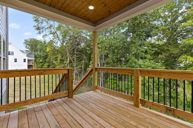 deck featuring a lawn