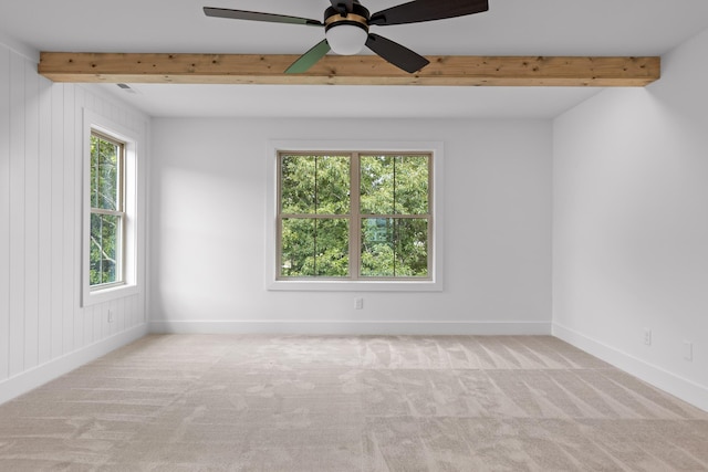 empty room with light carpet and ceiling fan