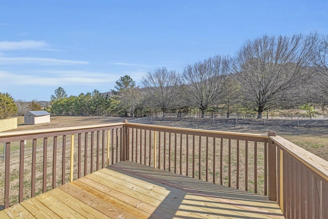 wooden deck featuring a shed