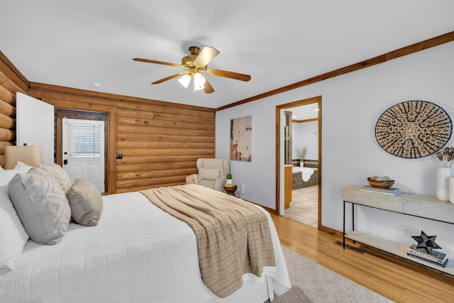 bedroom with crown molding, ceiling fan, log walls, and light wood-type flooring