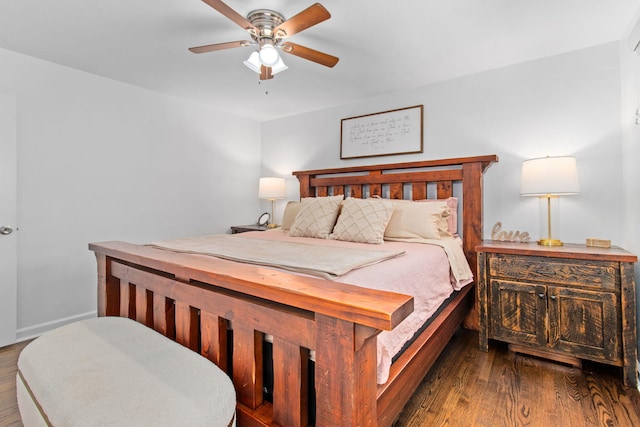 bedroom featuring dark wood-type flooring and ceiling fan