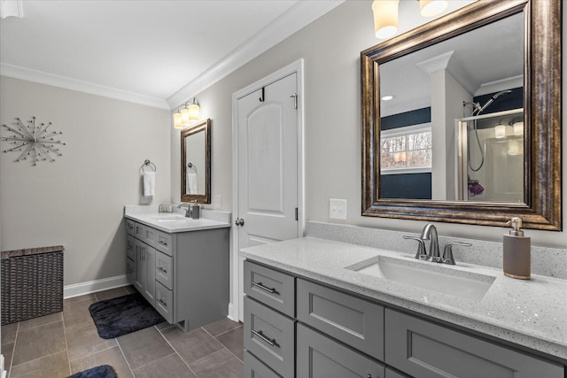 bathroom featuring vanity, ornamental molding, and tile patterned flooring