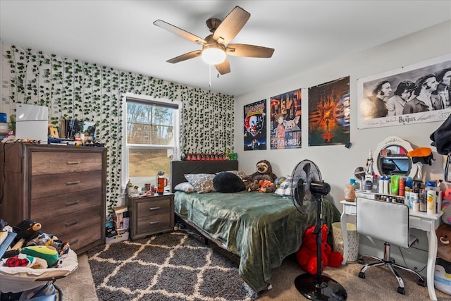 bedroom featuring ceiling fan and carpet floors