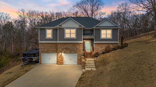 view of front of home with a garage