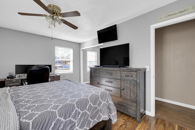 bedroom featuring hardwood / wood-style flooring and ceiling fan