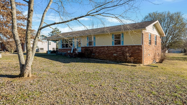 ranch-style house with a front yard