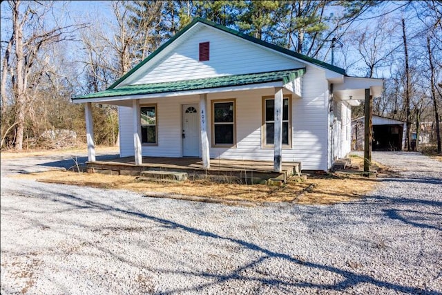 farmhouse inspired home featuring a porch