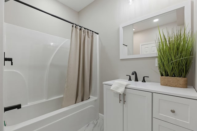 bathroom featuring shower / bathtub combination with curtain and vanity