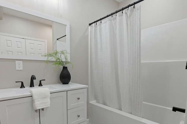 bathroom with vanity and shower / bathtub combination with curtain