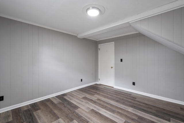 bonus room featuring hardwood / wood-style floors and wooden walls