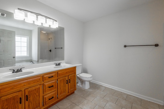 full bathroom with plus walk in shower, vanity, tile patterned floors, and toilet