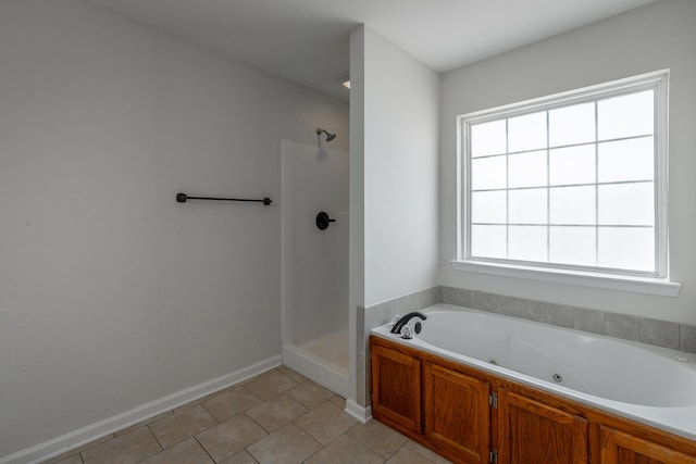 bathroom featuring tile patterned floors and plus walk in shower