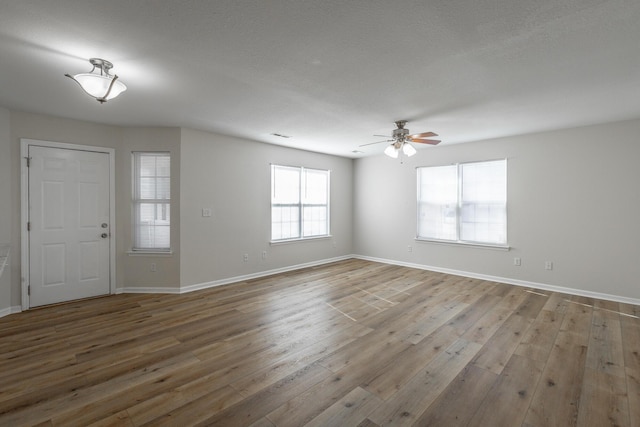 entryway featuring hardwood / wood-style floors and ceiling fan