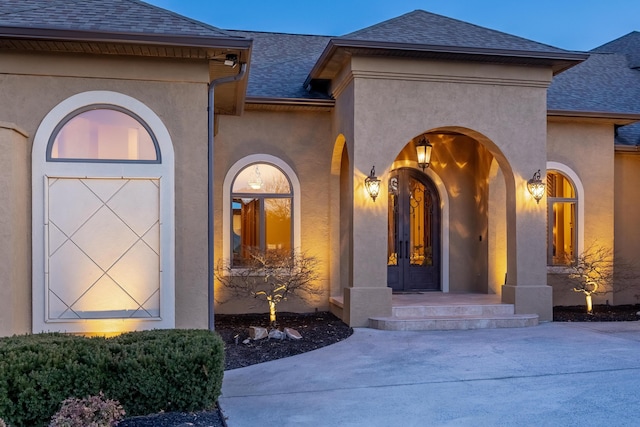 view of exterior entry with french doors