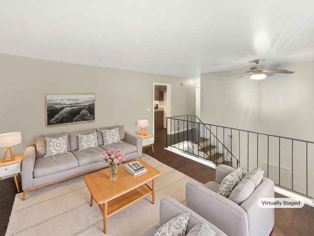 living room featuring ceiling fan