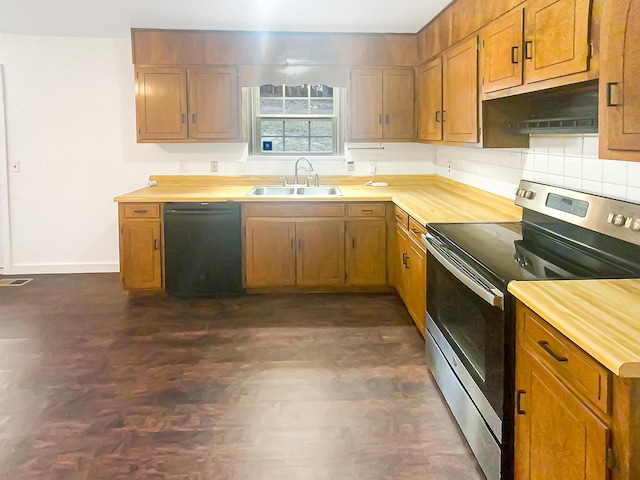 kitchen with electric stove, dishwasher, and sink