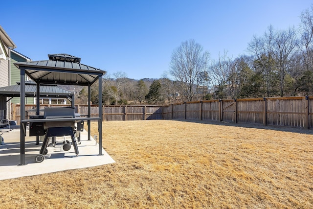 view of yard featuring a gazebo and a patio