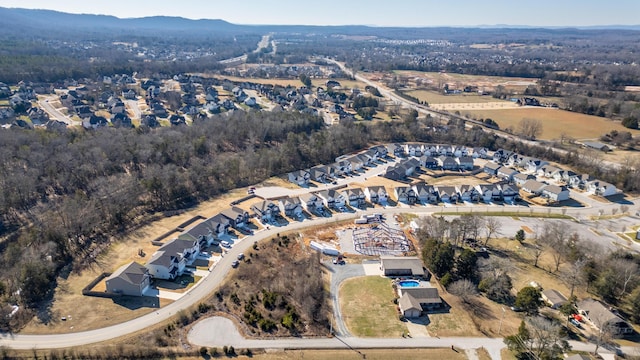 drone / aerial view featuring a mountain view