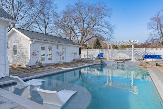 view of pool featuring french doors, an outdoor structure, and a pergola