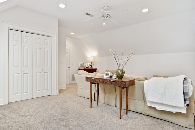 office area with ceiling fan, light colored carpet, and vaulted ceiling