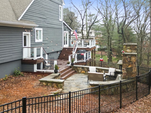 exterior space featuring an outdoor hangout area and a patio area