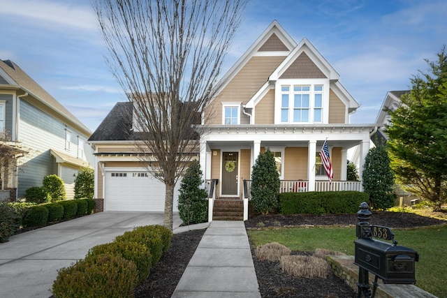 craftsman-style house with a garage and covered porch