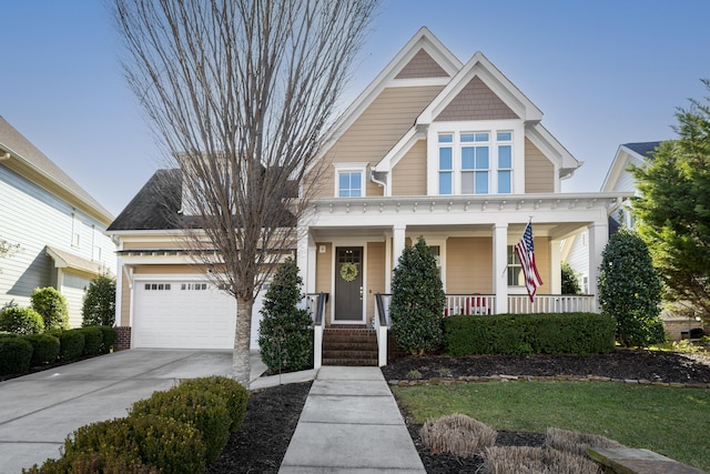 craftsman house featuring a garage and covered porch