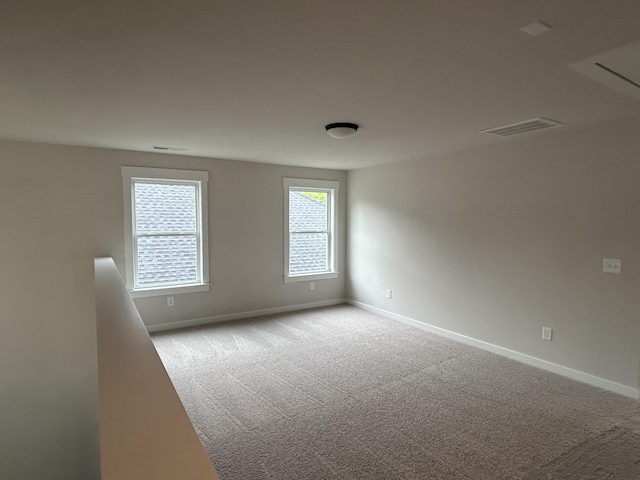 7553 Snow Cone Way Unit 17, Ooltewah, TN 37363 - spare room featuring baseboards and carpet