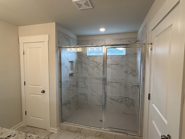 7553 Snow Cone Way Unit 17, Ooltewah, TN 37363 - bathroom with marble look tile flooring, a marble finish shower, baseboards, and recessed lighting