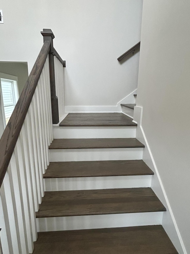 7553 Snow Cone Way Unit 17, Ooltewah, TN 37363 - stairway with baseboards and wood finished floors