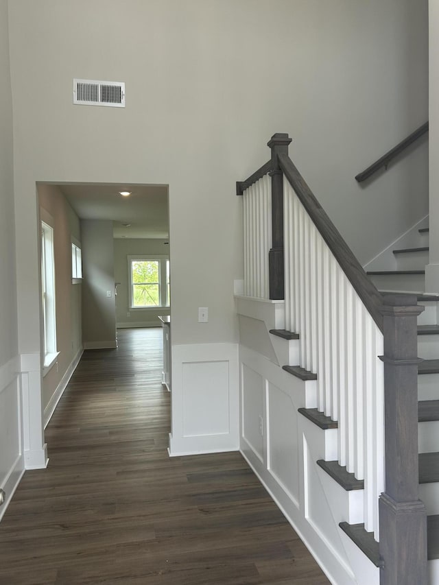 7553 Snow Cone Way Unit 17, Ooltewah, TN 37363 - stairway with a wainscoted wall, wood finished floors, and a decorative wall