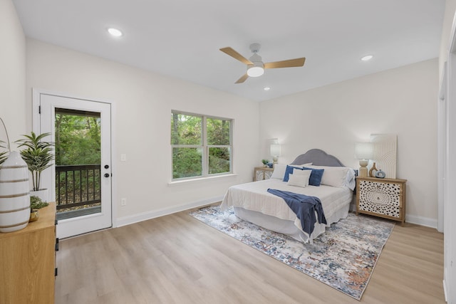 bedroom with access to exterior, ceiling fan, and light hardwood / wood-style flooring