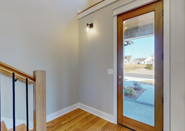 doorway to outside with light hardwood / wood-style floors