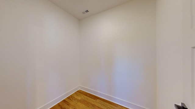 unfurnished room featuring wood-type flooring