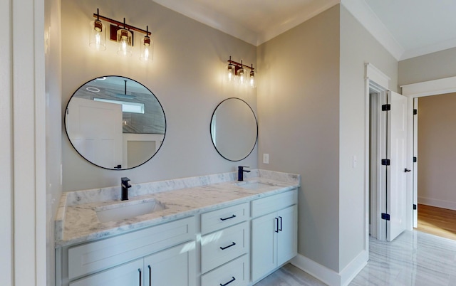 bathroom featuring vanity and ornamental molding